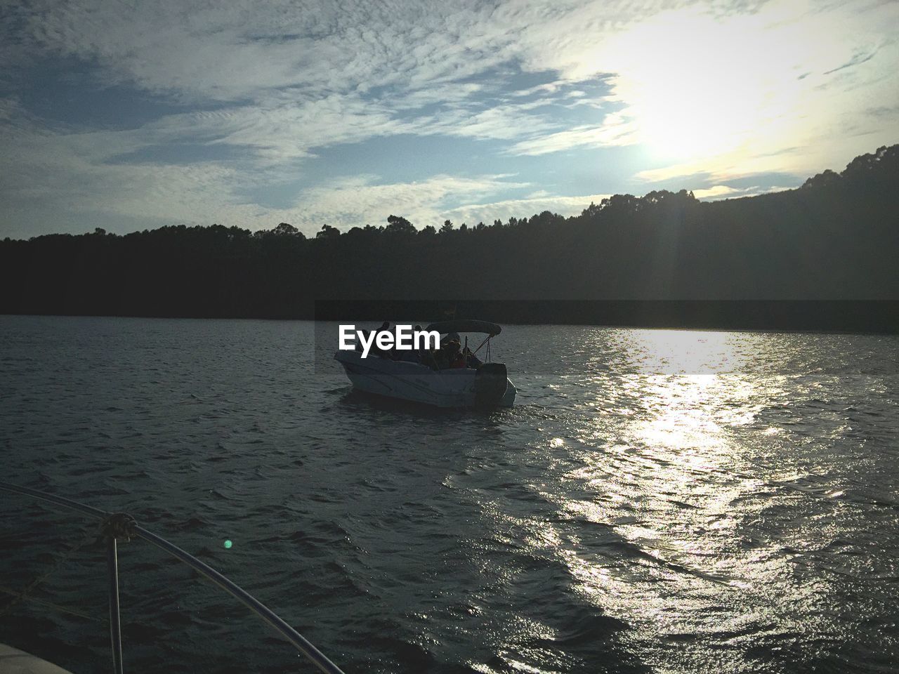 VIEW OF BOAT IN RIVER