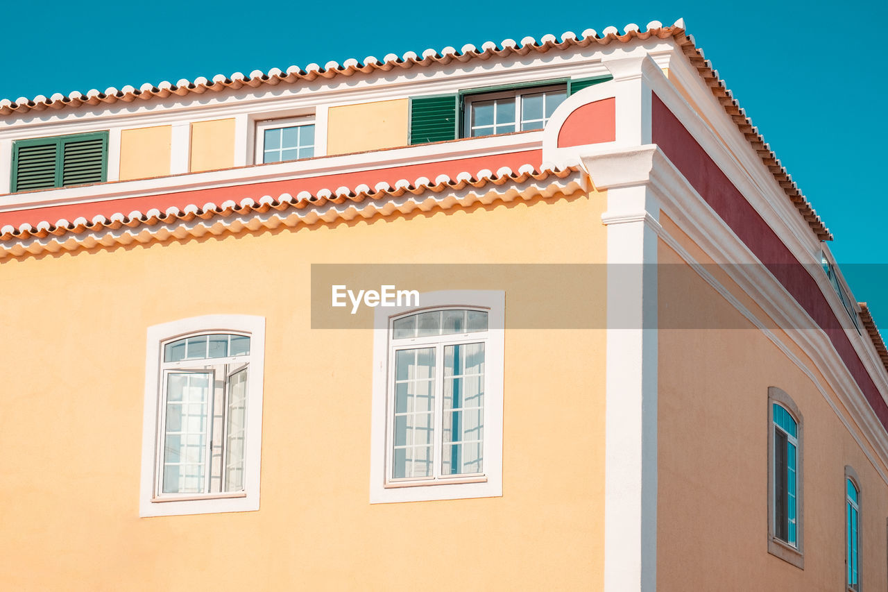 Low angle view of building against clear sky