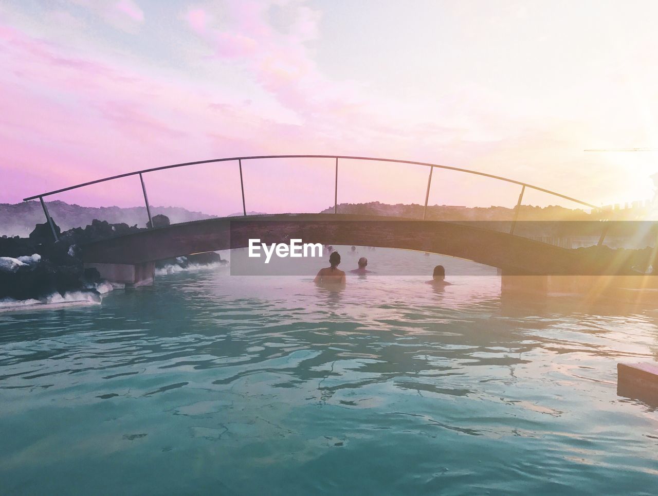 SWIMMING POOL IN SEA AGAINST SKY