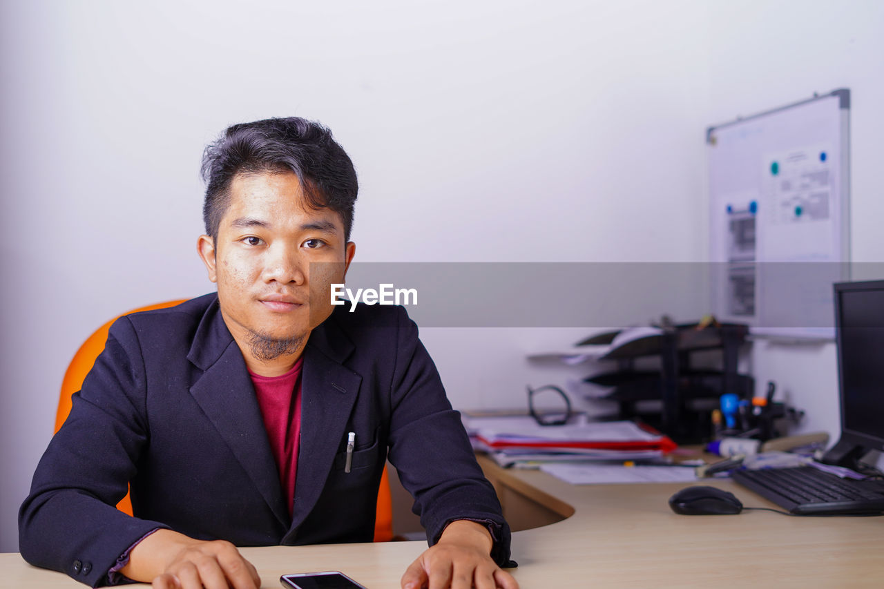 PORTRAIT OF A MAN WORKING
