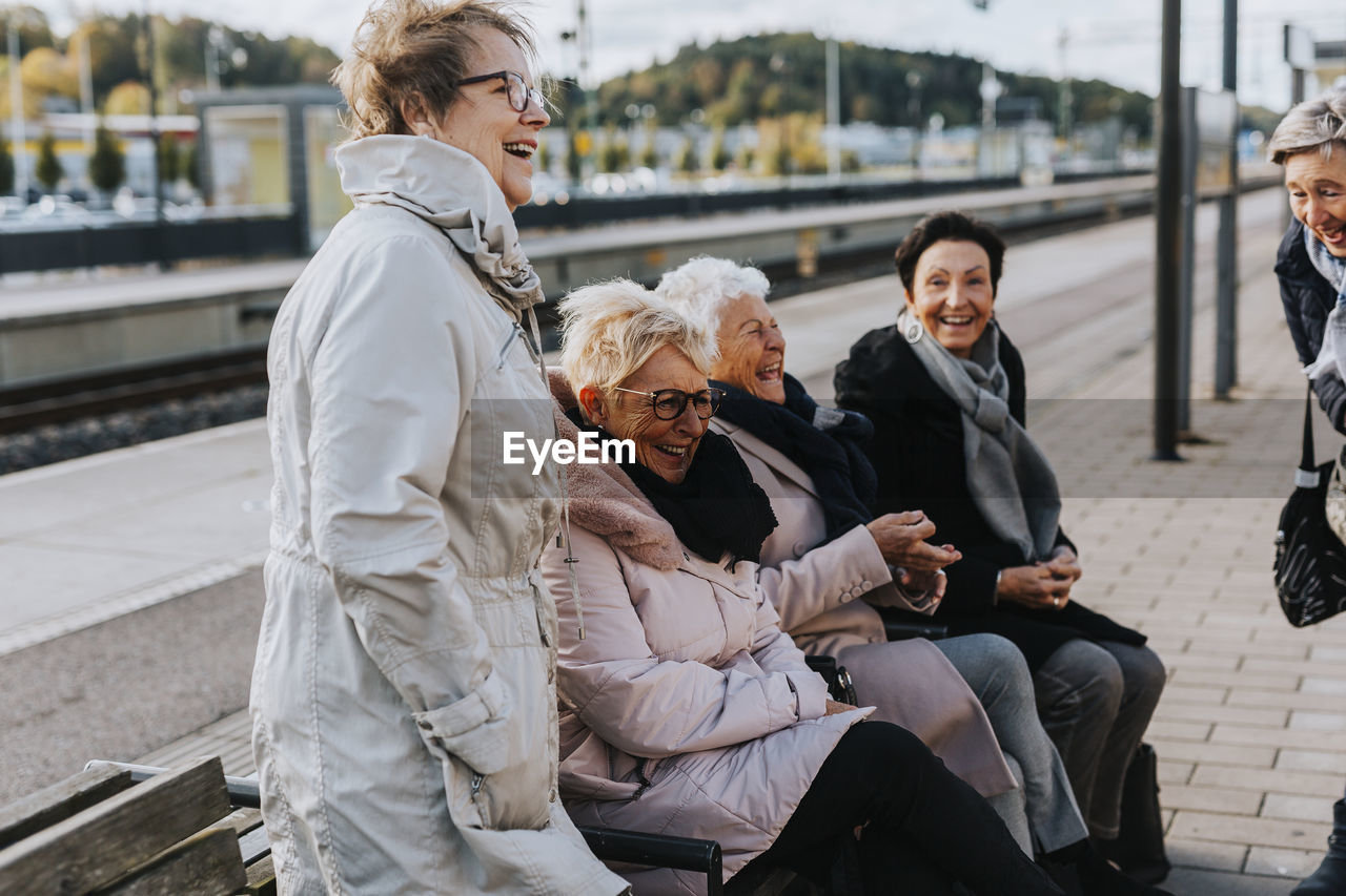 Women on train station platform