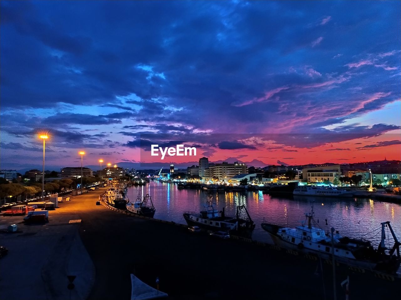 VIEW OF HARBOR AT SUNSET