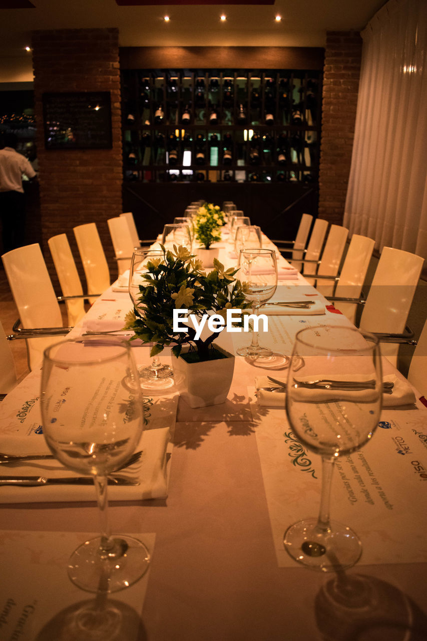 CLOSE-UP OF DINING TABLE AT RESTAURANT