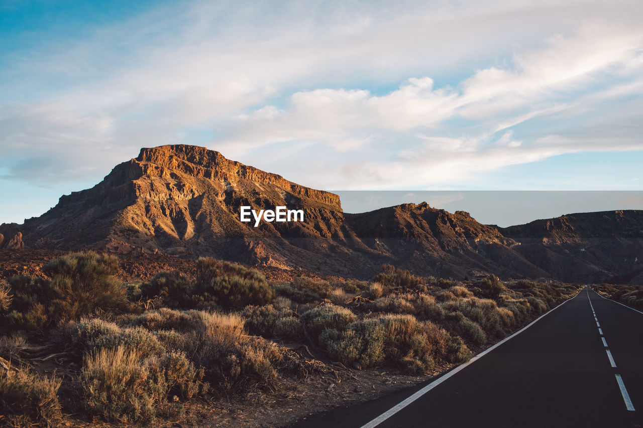 Scenic view of rocky mountains against sky