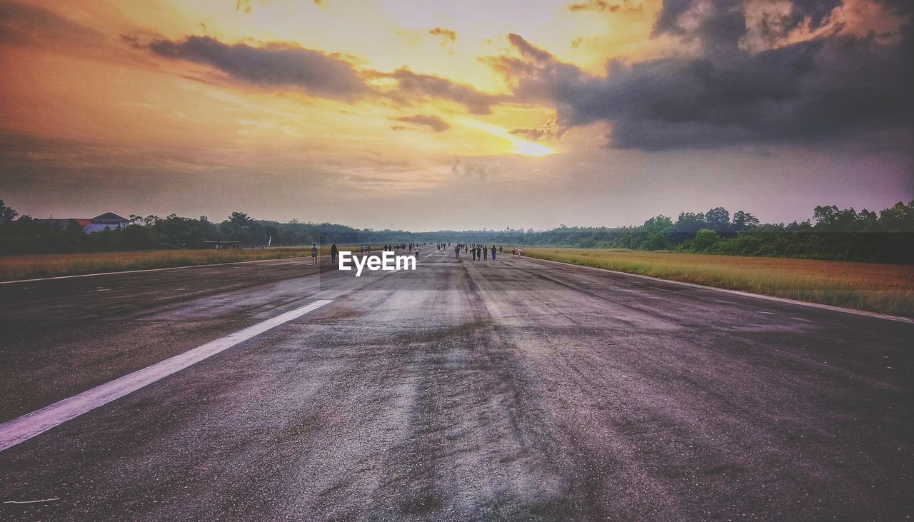 Road against sky during sunset