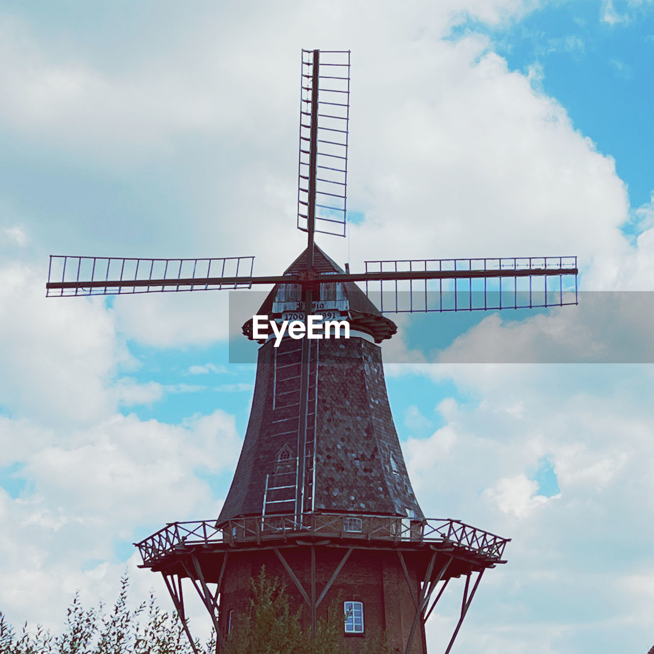 windmill, mill, sky, cloud, environmental conservation, renewable energy, turbine, wind power, wind turbine, architecture, alternative energy, power generation, nature, environment, built structure, traditional windmill, building, day, no people, technology, low angle view, outdoors, landscape, tower, rural scene, history, the past, building exterior, industry