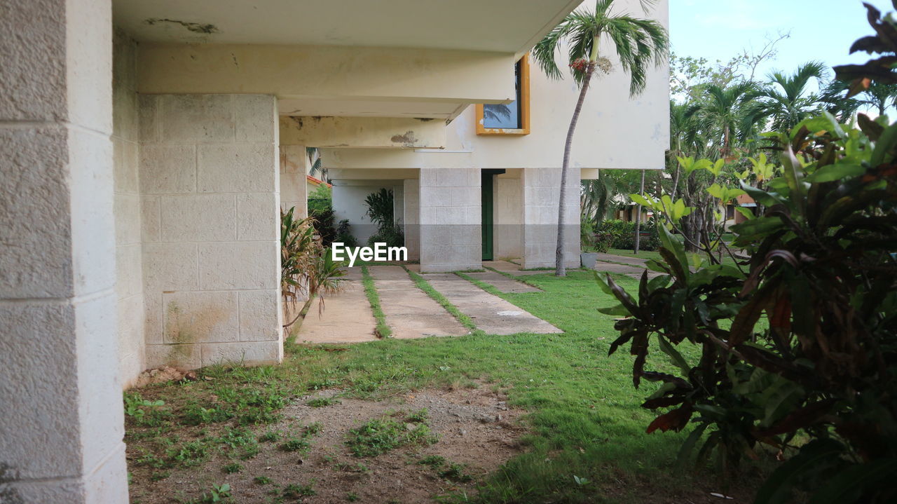 VIEW OF ALLEY AMIDST HOUSES