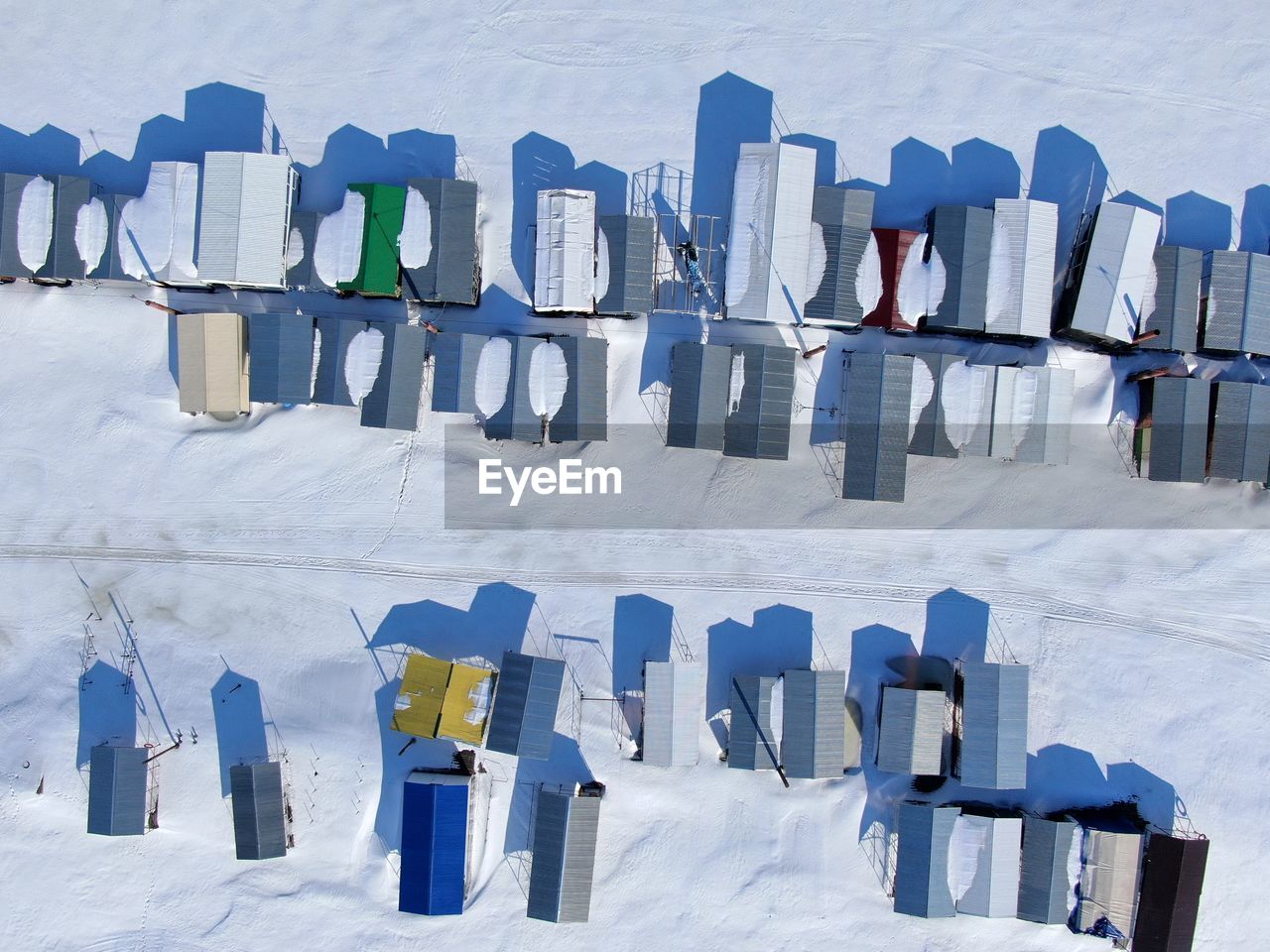 Directly above shot of snow covered buildings in town