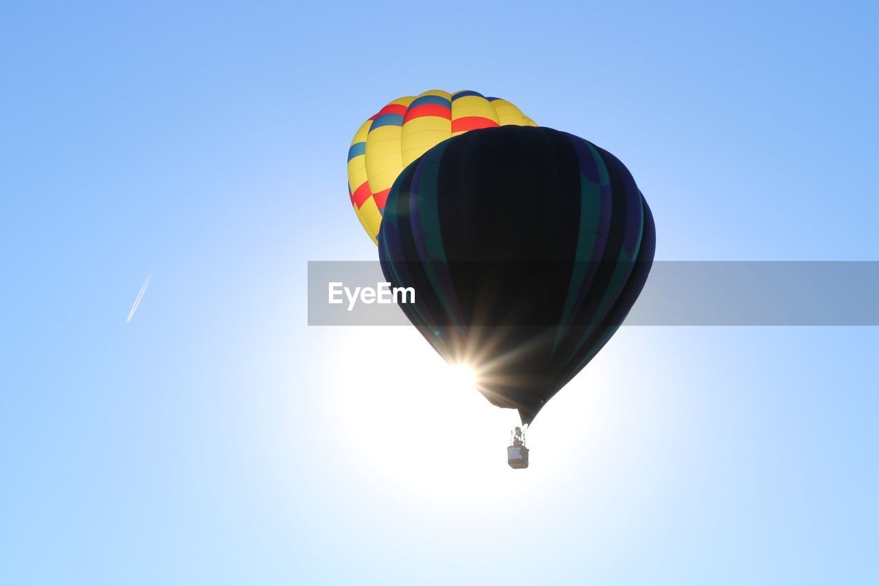 LOW ANGLE VIEW OF HOT AIR BALLOONS AGAINST SKY