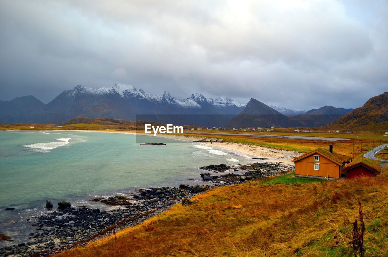 Beautiful beach with the house on the coastline