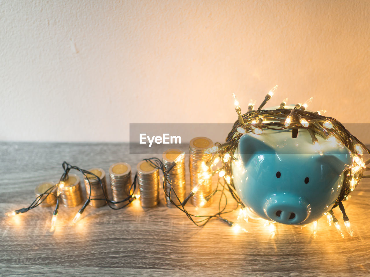 CLOSE-UP OF ILLUMINATED DECORATION ON TABLE