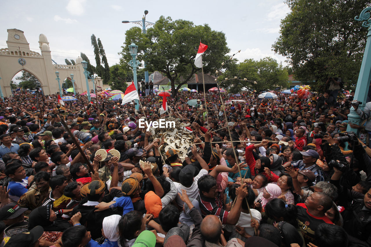 Crowd on street during ritual celebrations