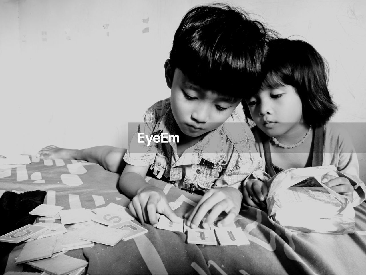 Little kids studying together