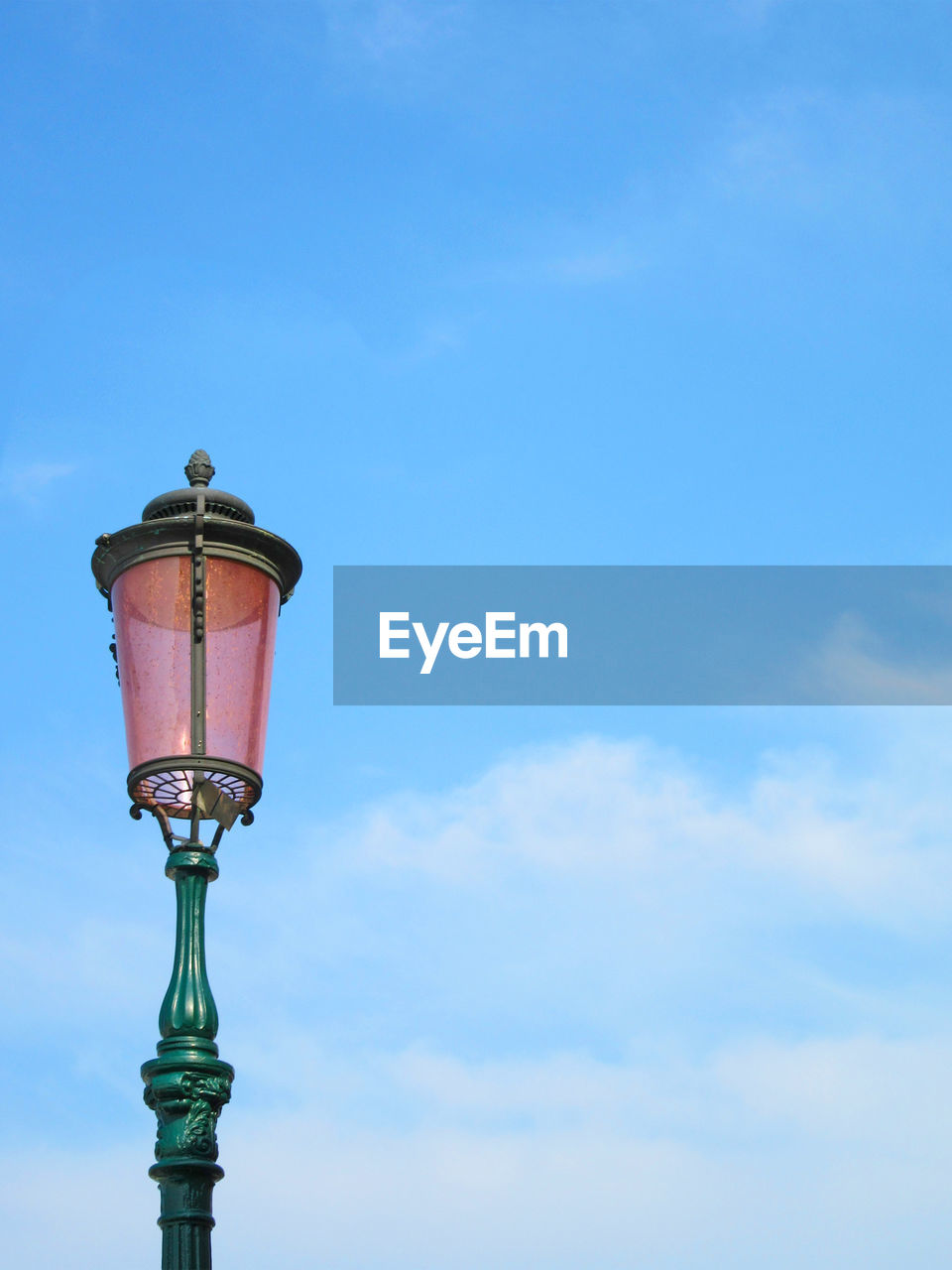 Low angle view of street light against sky