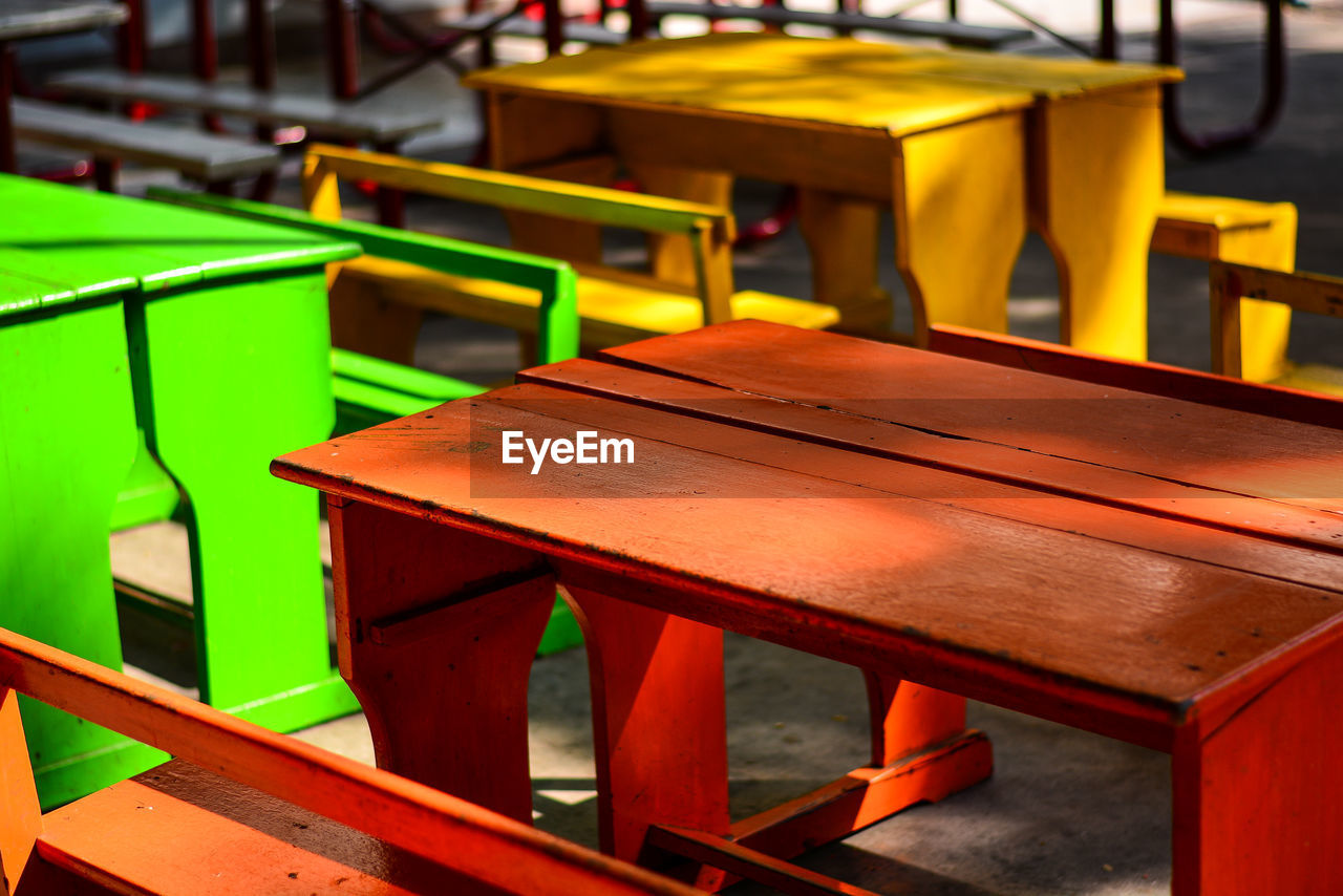 Empty multi colored picnic table outdoors