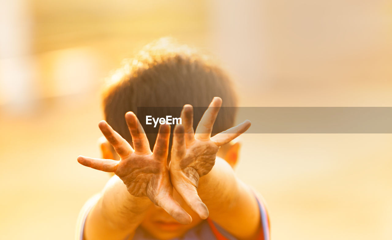 Happy playing outside with dirty hands