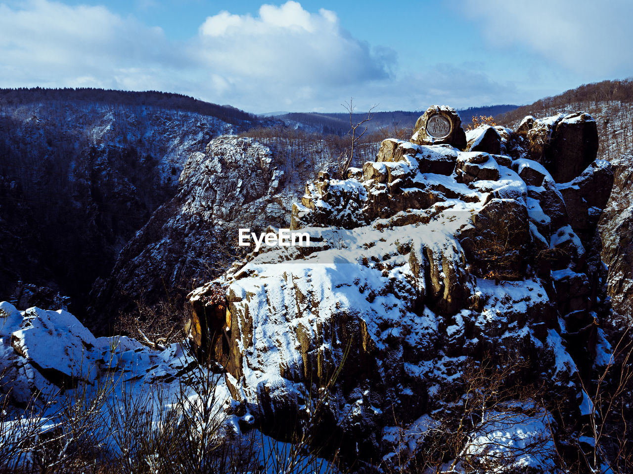 AERIAL VIEW OF SNOW COVERED LANDSCAPE