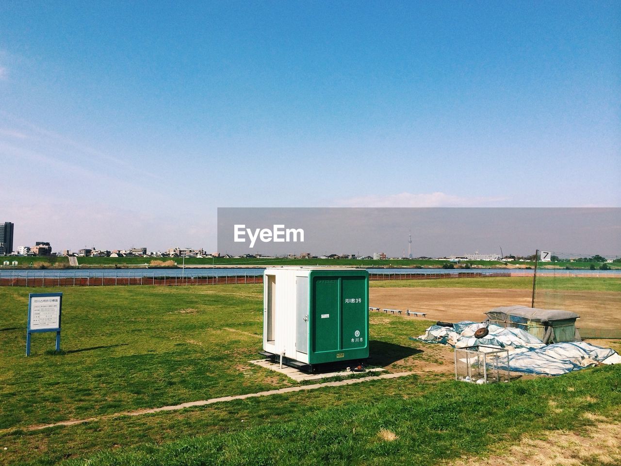 Bathroom on field against sky