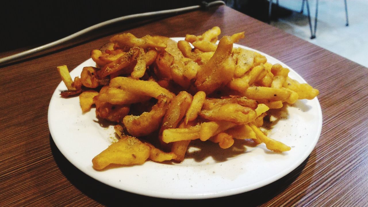 CLOSE-UP OF FOOD SERVED ON TABLE