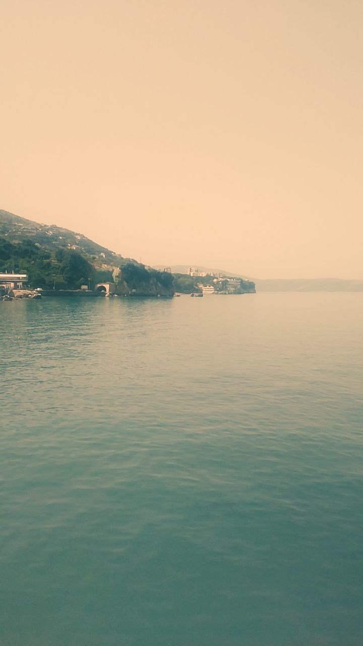 VIEW OF BOATS IN SEA