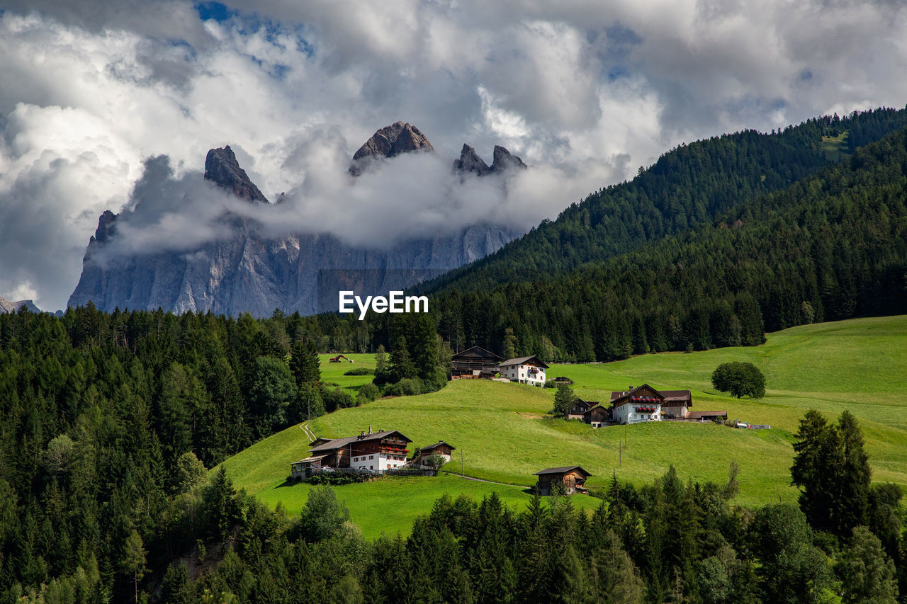 Scenic view of landscape and mountains against sky