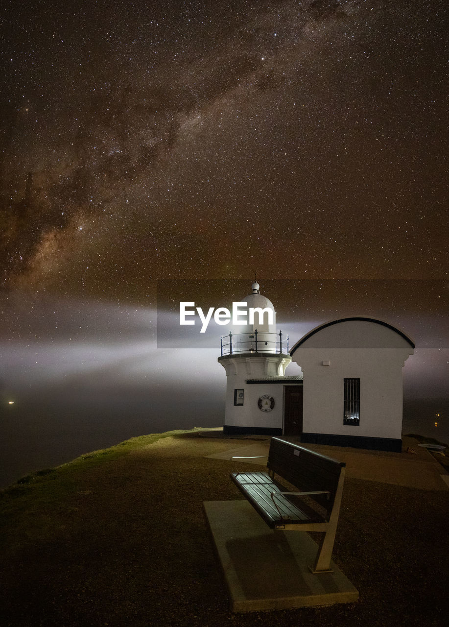 scenic view of beach against sky at night