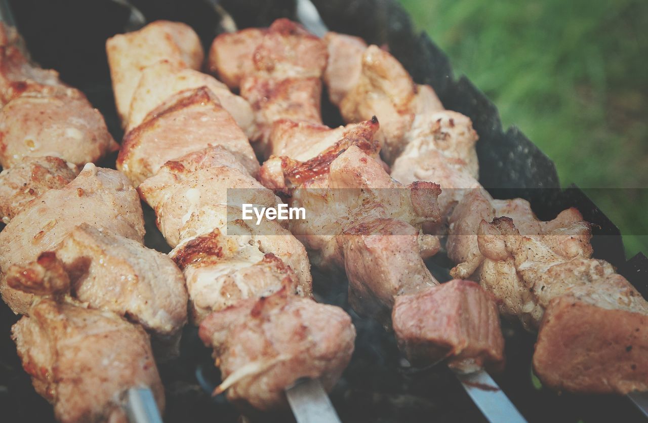 Close-up of meat on barbecue grill