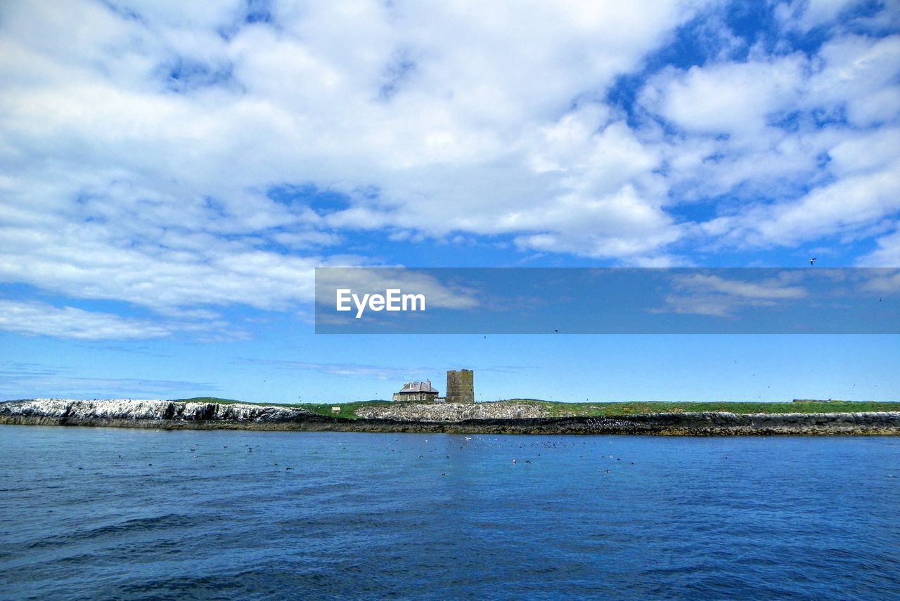 Lighthouse on farne island against sky