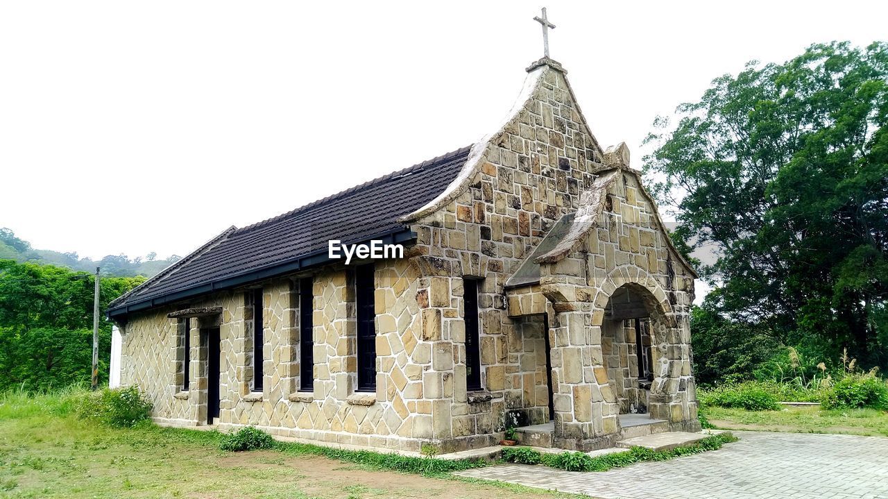 TEMPLE AGAINST BUILDING