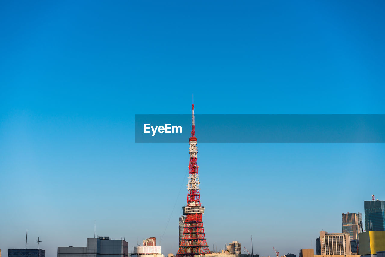 VIEW OF BUILDINGS AGAINST BLUE SKY