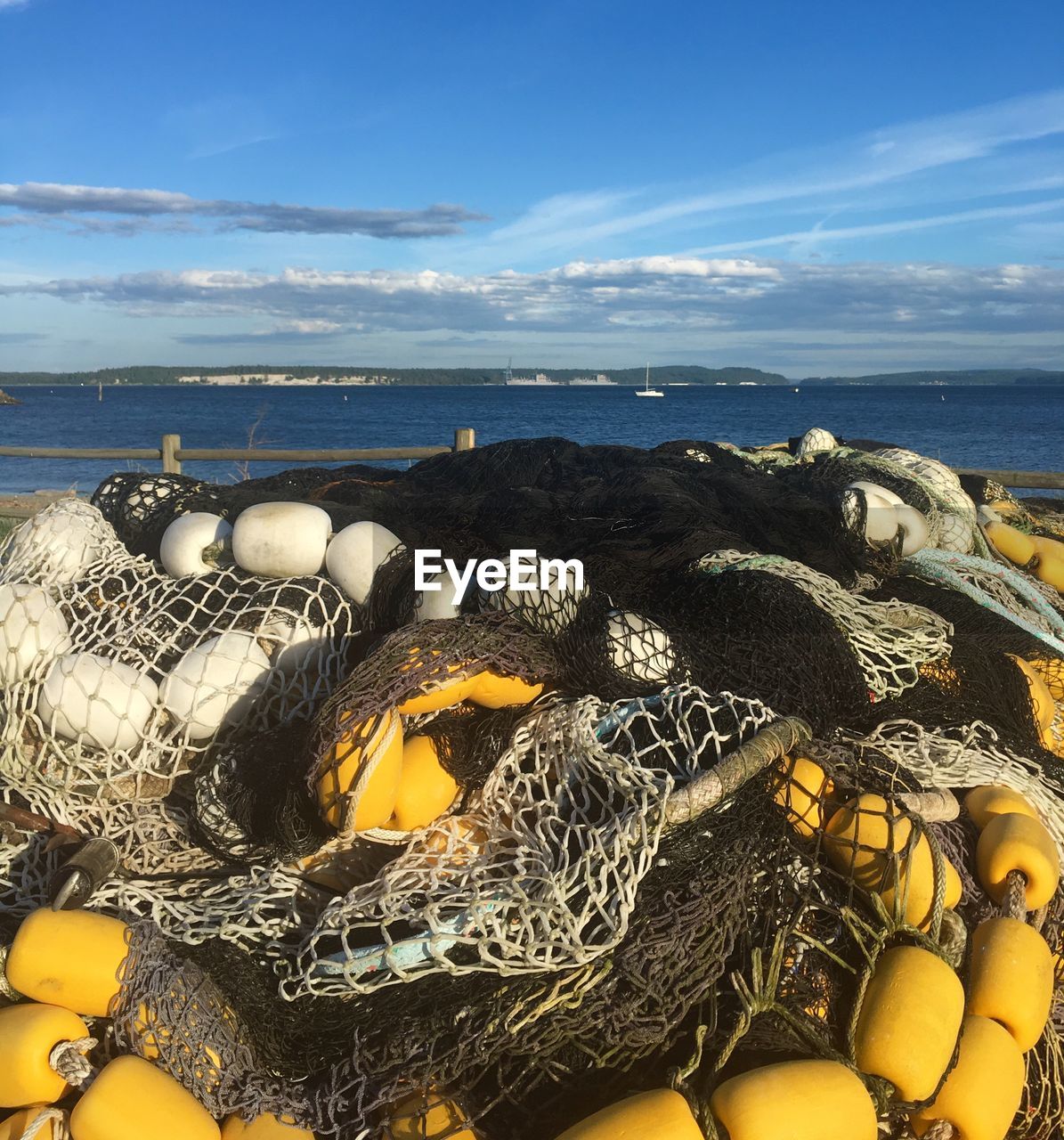 HIGH ANGLE VIEW OF FISHING NET ON SHORE