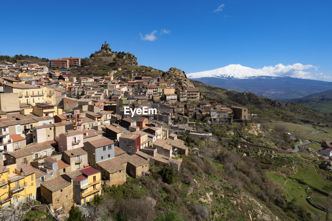 Village of cesaro the etna volcano in the background on the italian island of sicily