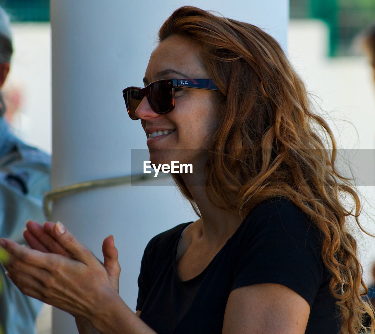 BEAUTIFUL YOUNG WOMAN WEARING EYEGLASSES