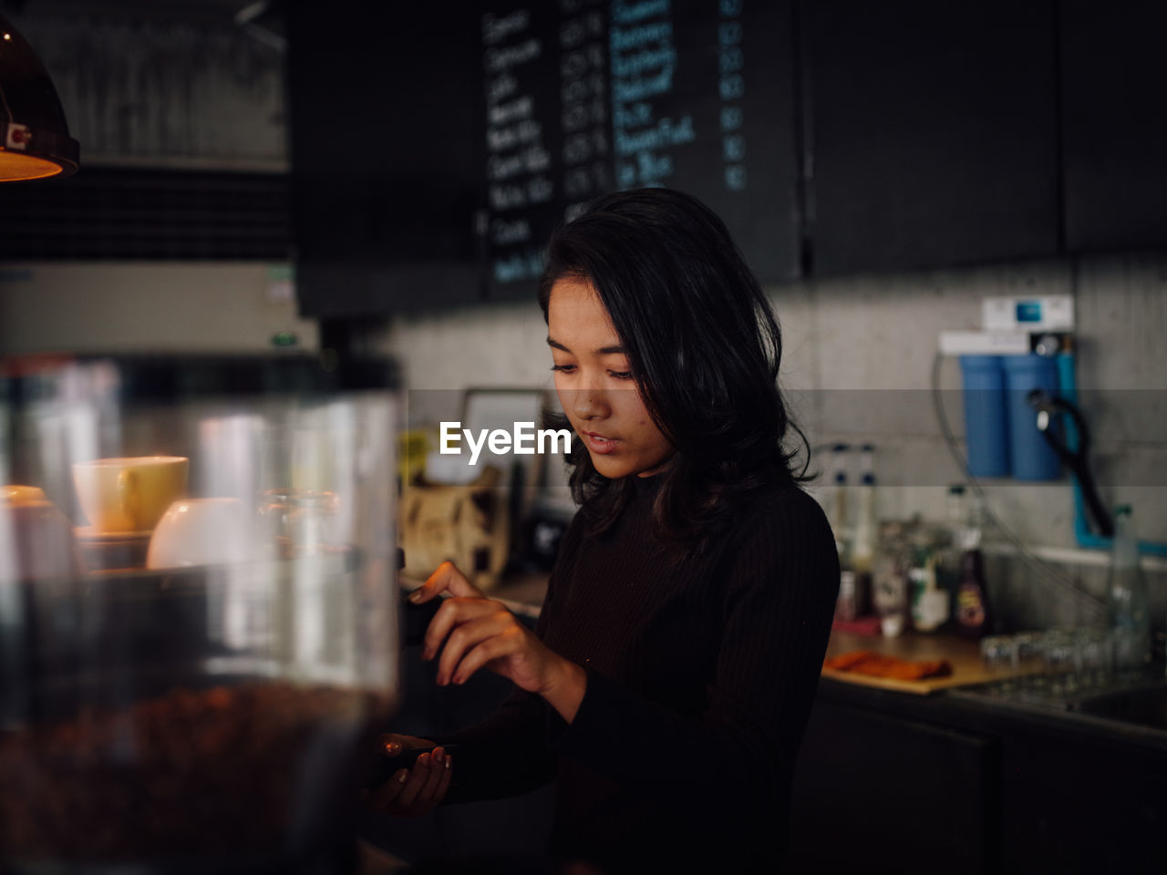 Barista working in cafe