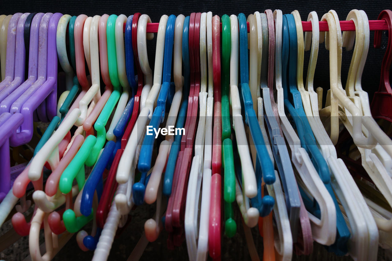 Close-up of colorful coat hangers