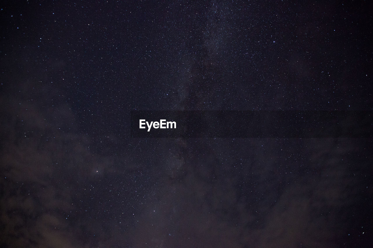 LOW ANGLE VIEW OF STARS AGAINST SKY