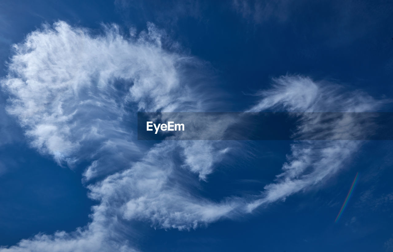 Low angle view of clouds in blue sky