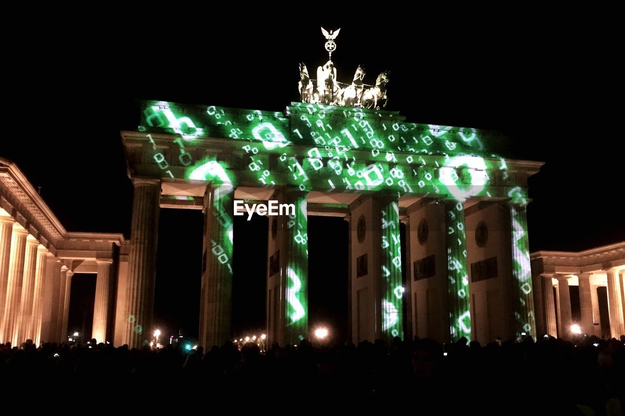 ILLUMINATED TEMPLE AT NIGHT