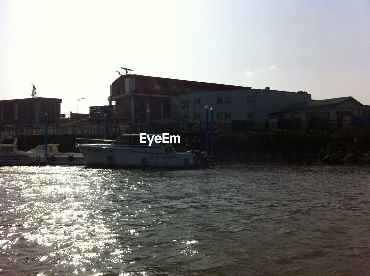 VIEW OF BOATS IN RIVER