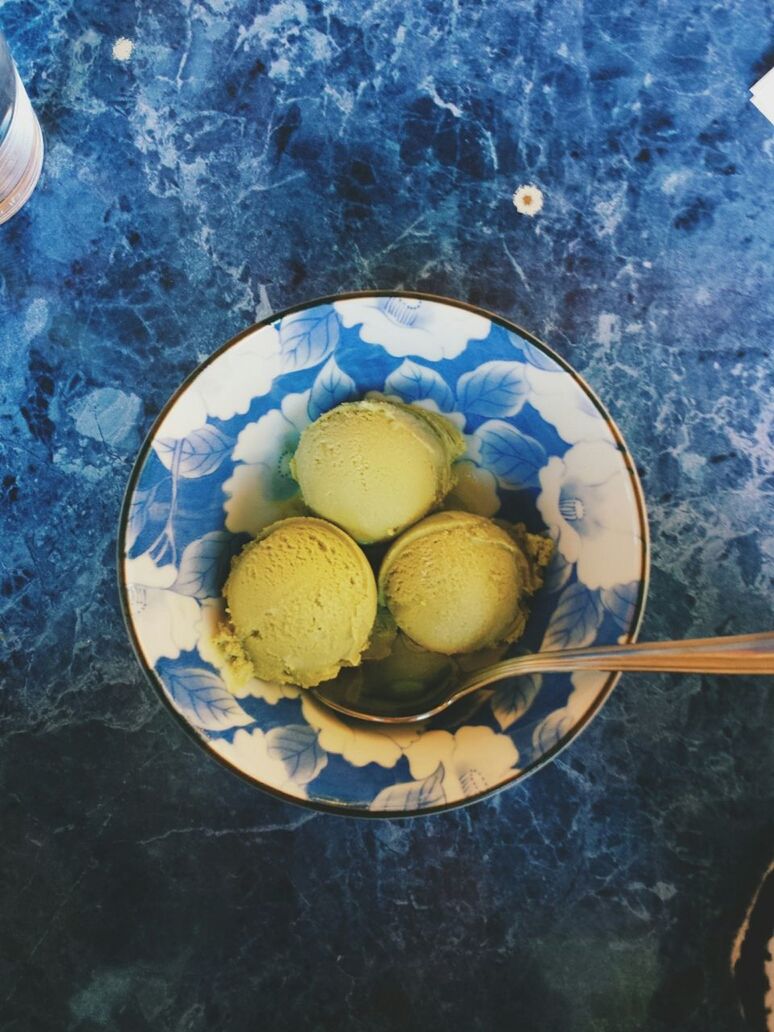 Directly above shot of green tea ice cream scoops on table
