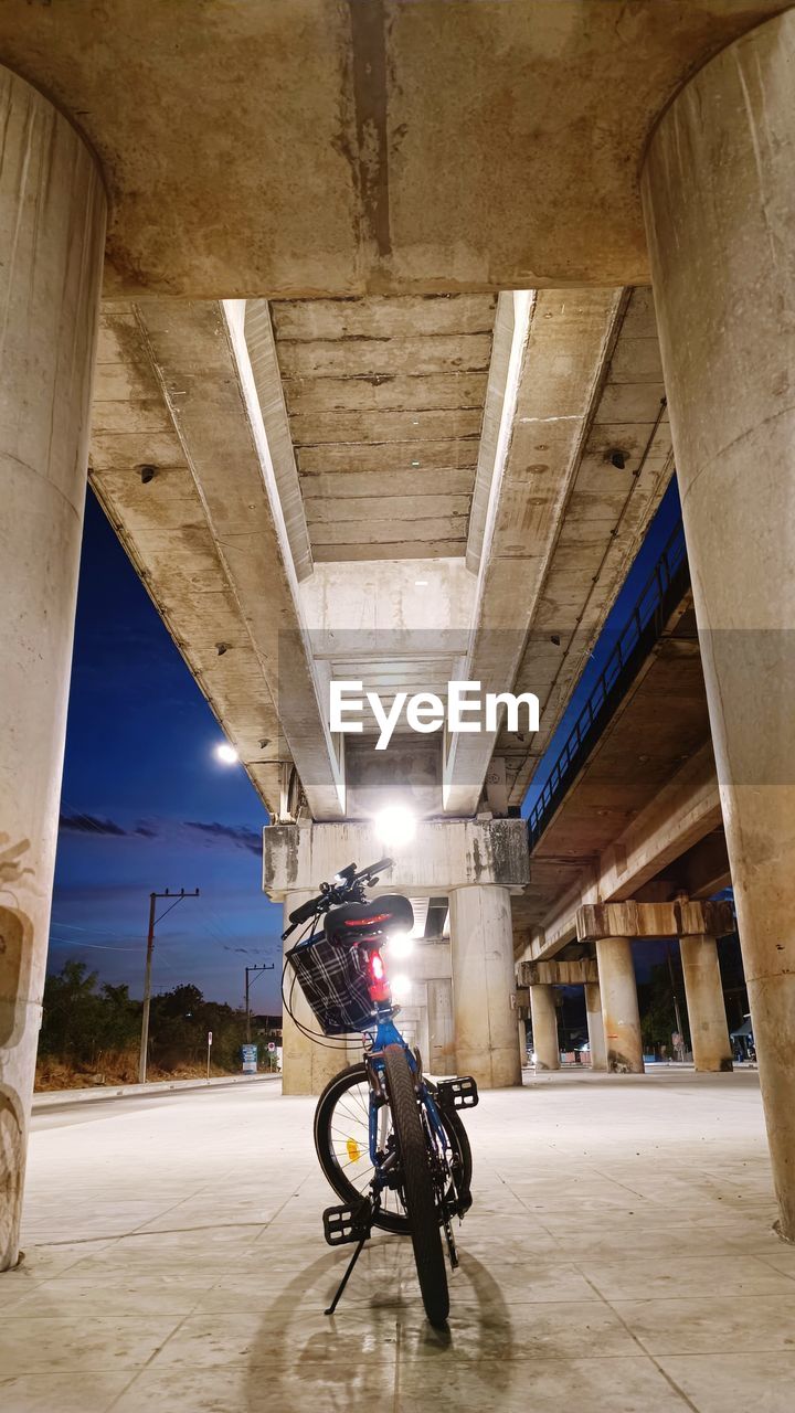 Low angle view of man walking on street