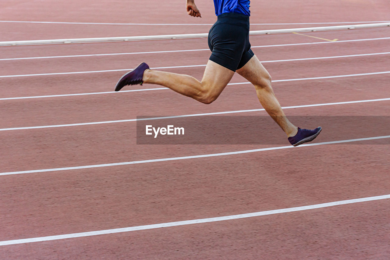 Legs male runner athlete run sprint race