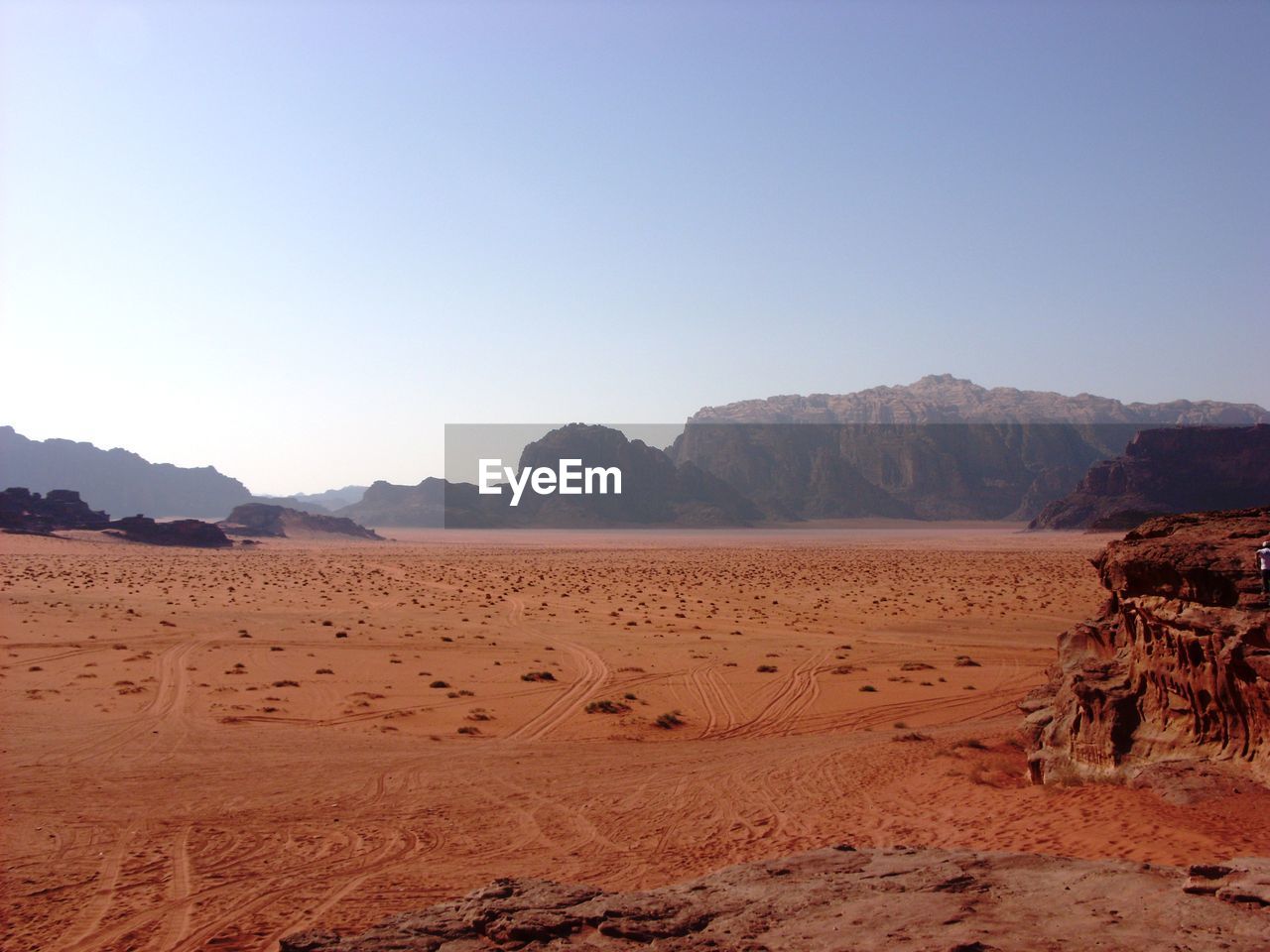 Scenic view of desert against clear sky