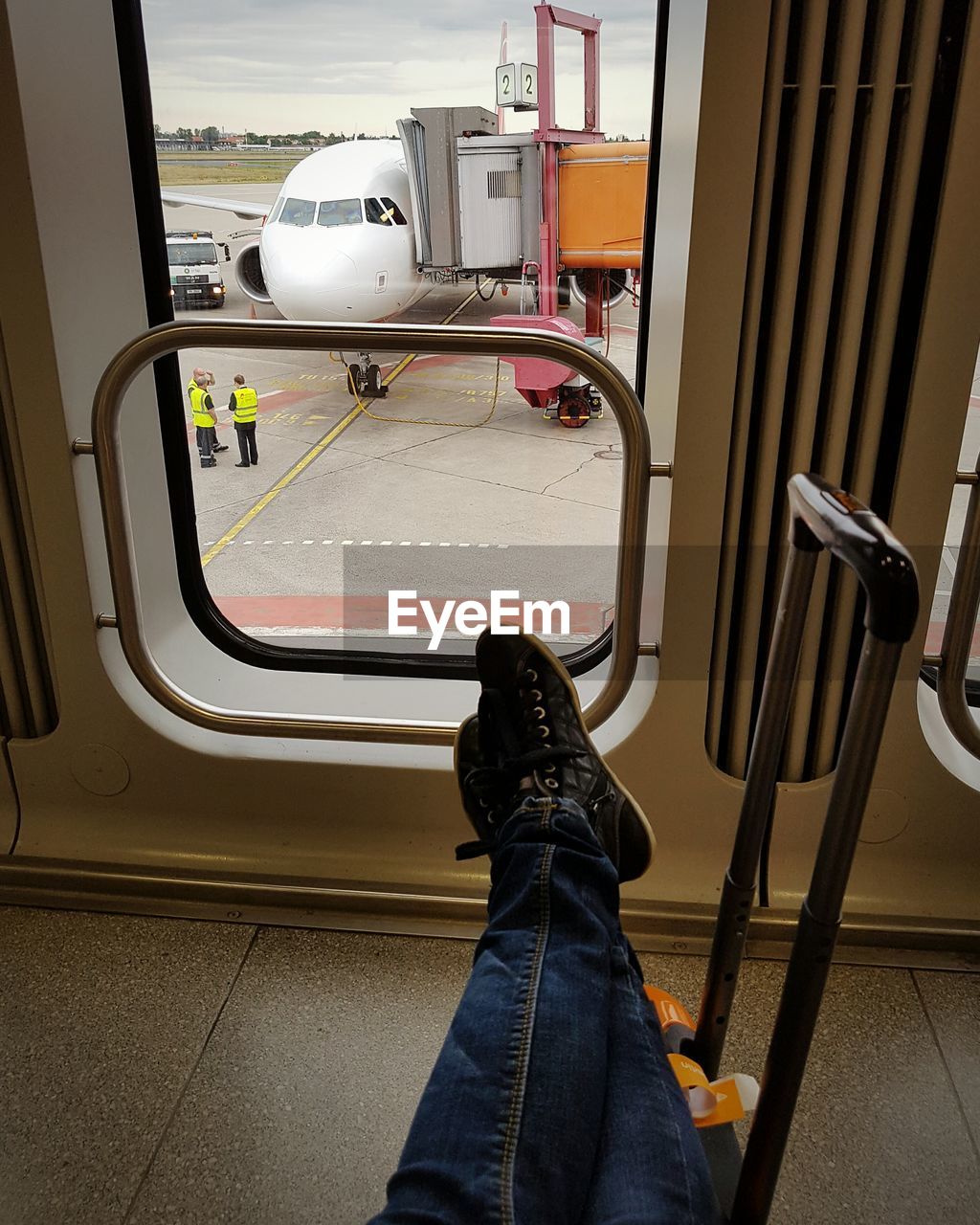 Woman waitng at airport