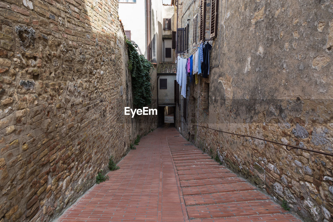 FOOTPATH AMIDST BUILDINGS