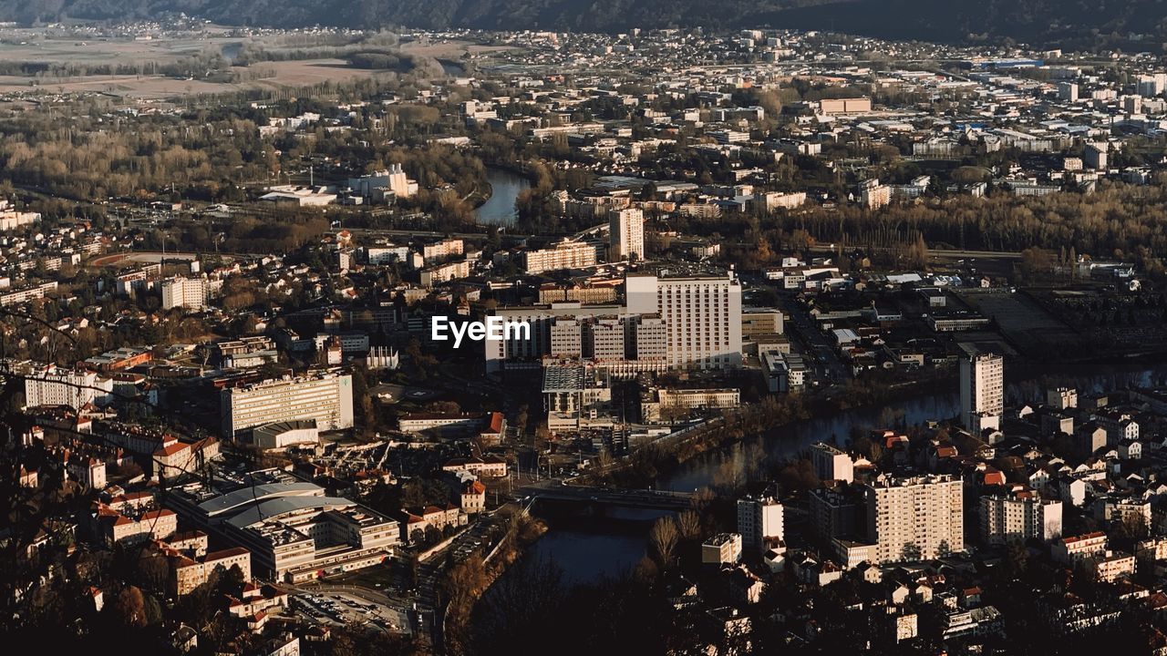 High angle view of illuminated city buildings