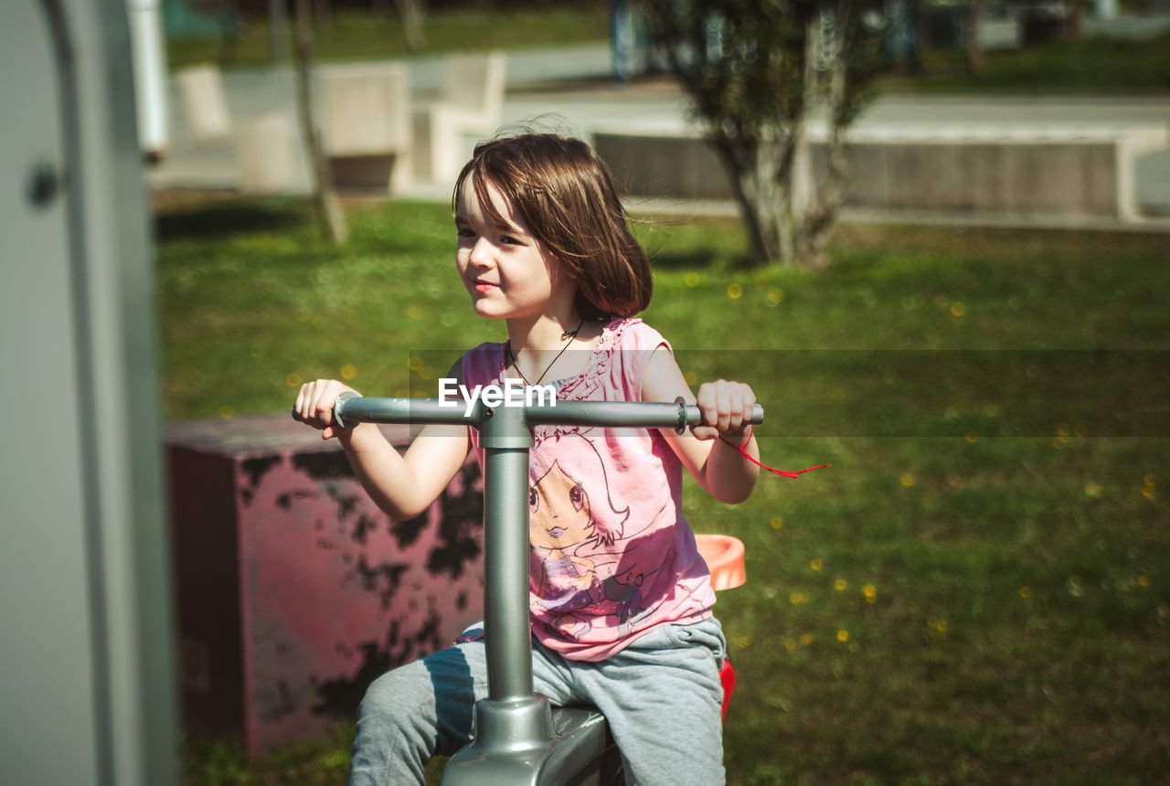 Small girl playing on the playground