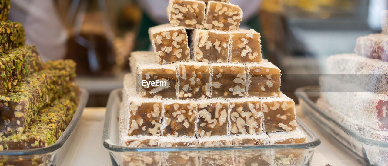CLOSE-UP OF ICE CREAM IN GLASS ON TABLE