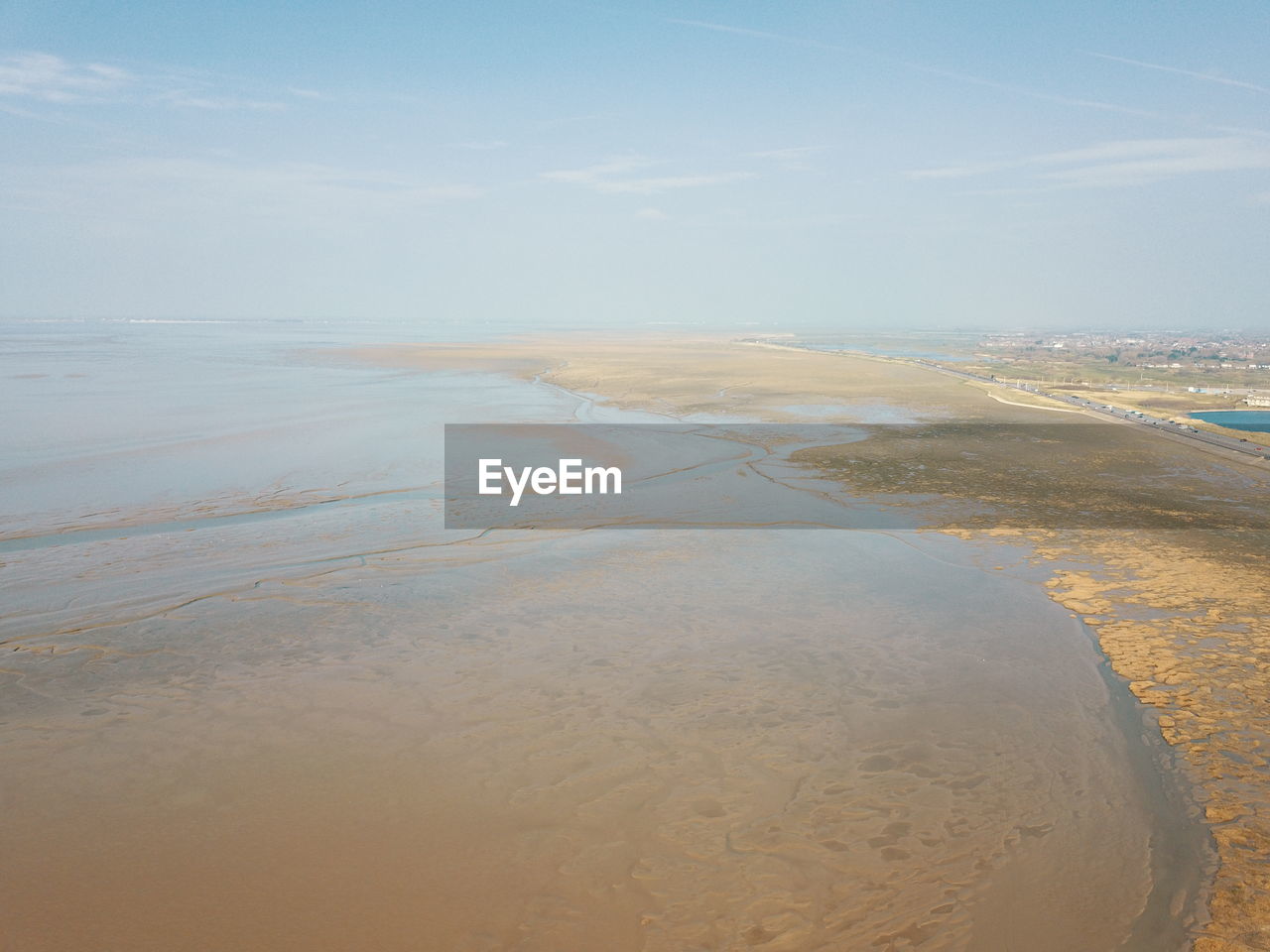 AERIAL VIEW OF BEACH AGAINST SKY