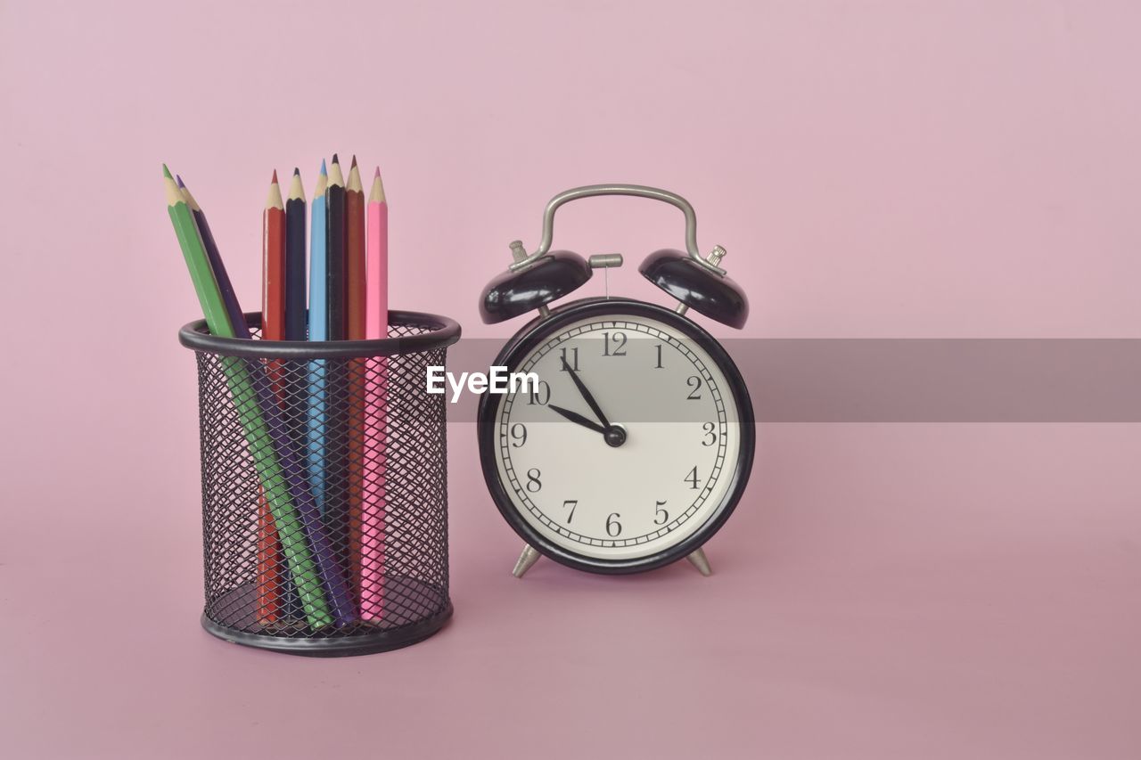 clock, time, alarm clock, studio shot, pink, no people, indoors, colored background, watch, still life, pink background, clock face, instrument of time